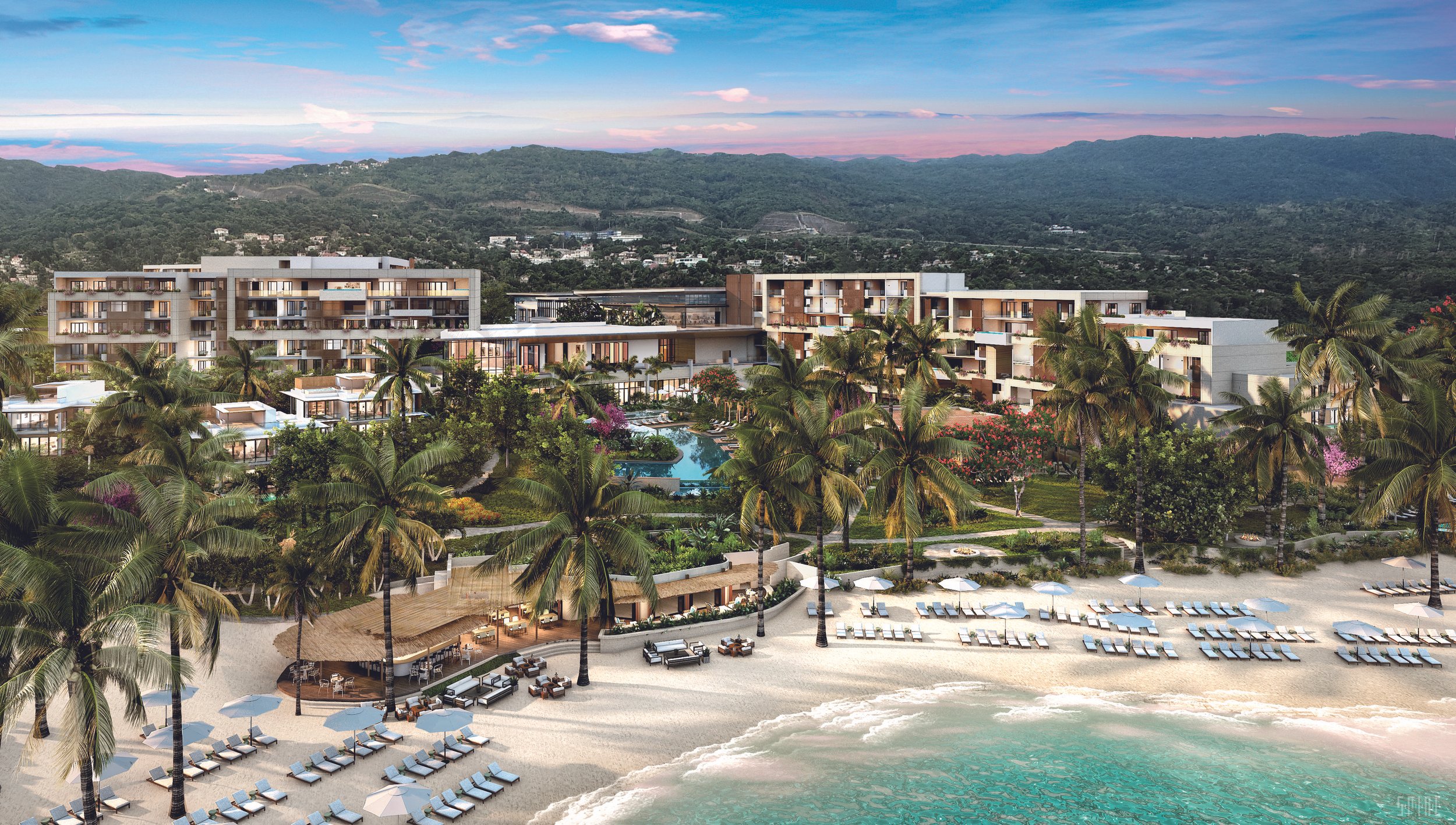 An aerial view of a luxurious beachfront resort with modern white buildings, lush greenery, palm trees, a swimming pool, sun loungers with umbrellas on the sandy beach, and mountains in the background under a colorful sky.